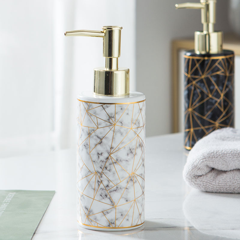 White and black marble soap dispenser with gold pump
